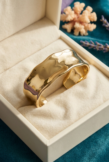 Organic Contour Gold-Tone Cuff Bracelet with a Smooth Open Shape and Modern Sculptural Finish